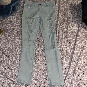 Girls size 12 blue ripped jeans.